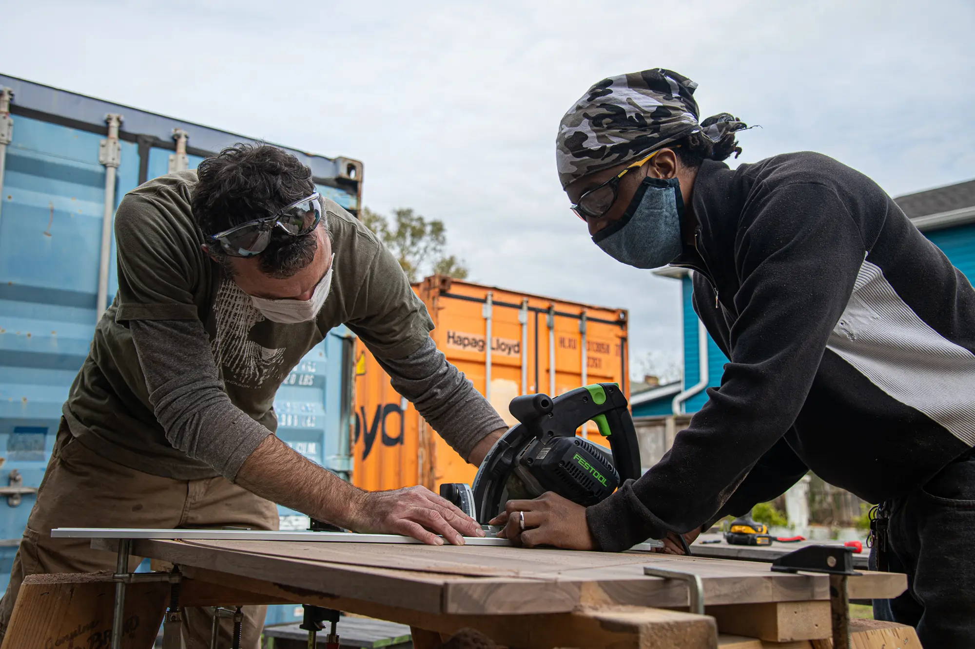 Doug Harmon and Troy Barnes work on a Freedom Library for Louisiana State Penitentiary at Angola.