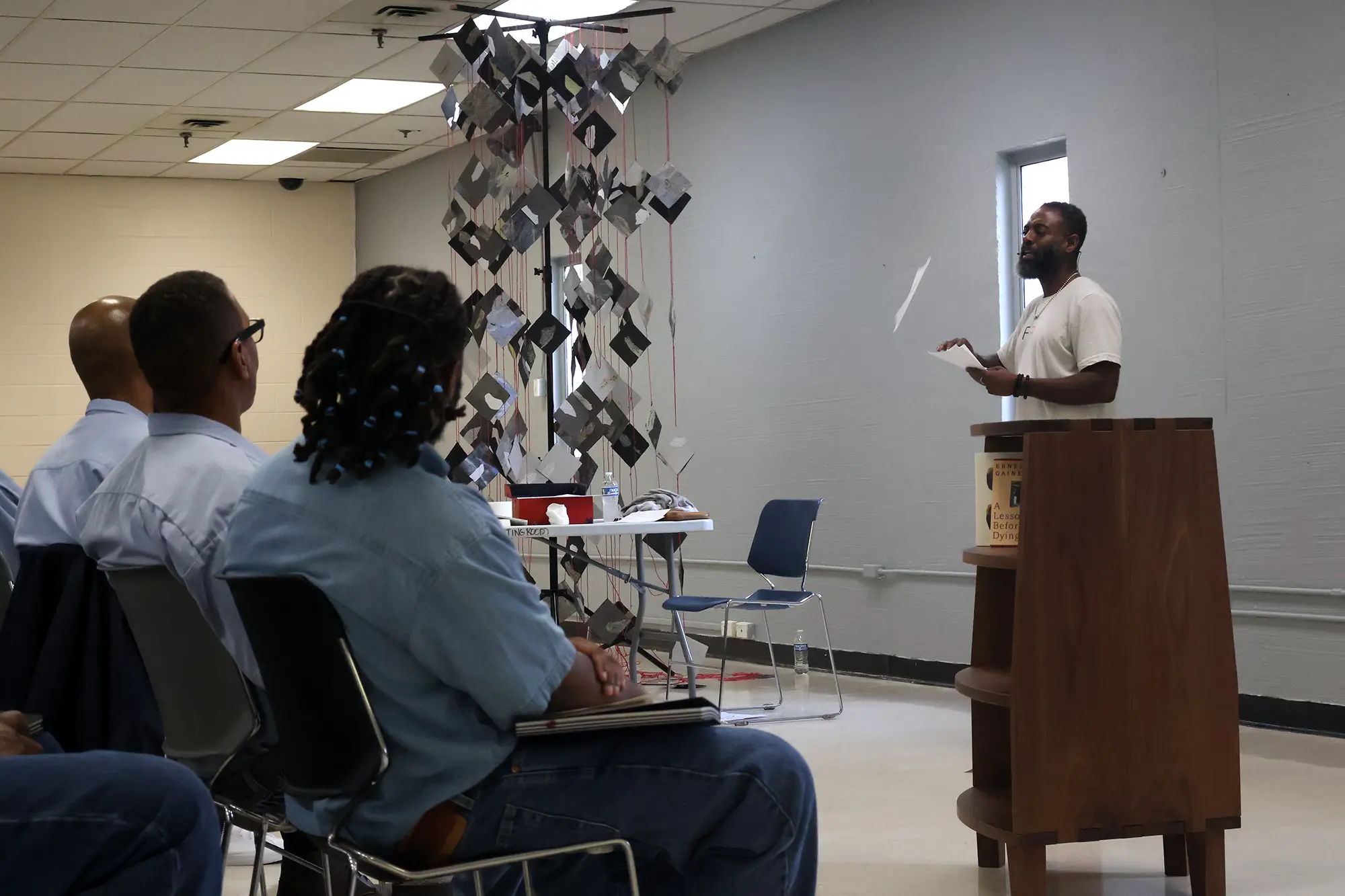 Freedom Reads Founder & CEO Reginald Dwayne Betts performs his solo show FELON: An American Washi Tale before a packed audience at Buckingham Correctional Center.