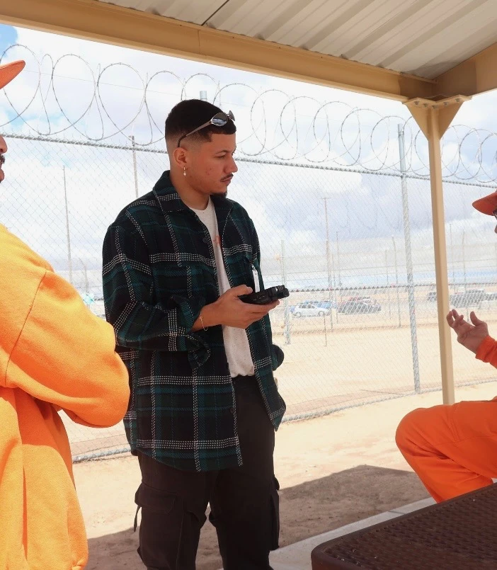 Freedom Reads Library Coordinator David Perez Jr Freedom Reads Library Coordinator David Perez Jr stands with an audio recorder.