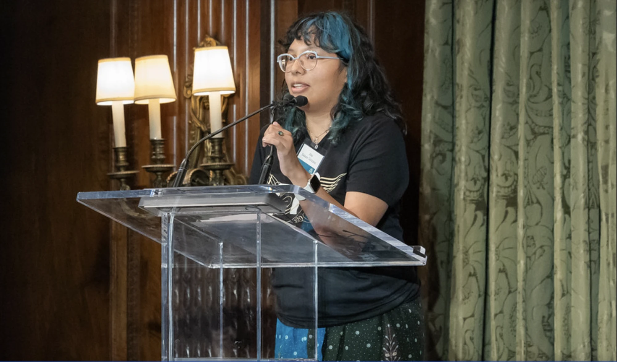 Freedom Reads Development Manager, Allie Salazar Gonzalez, one stage at the 2025 Inside Literary Prize Award Ceremony.