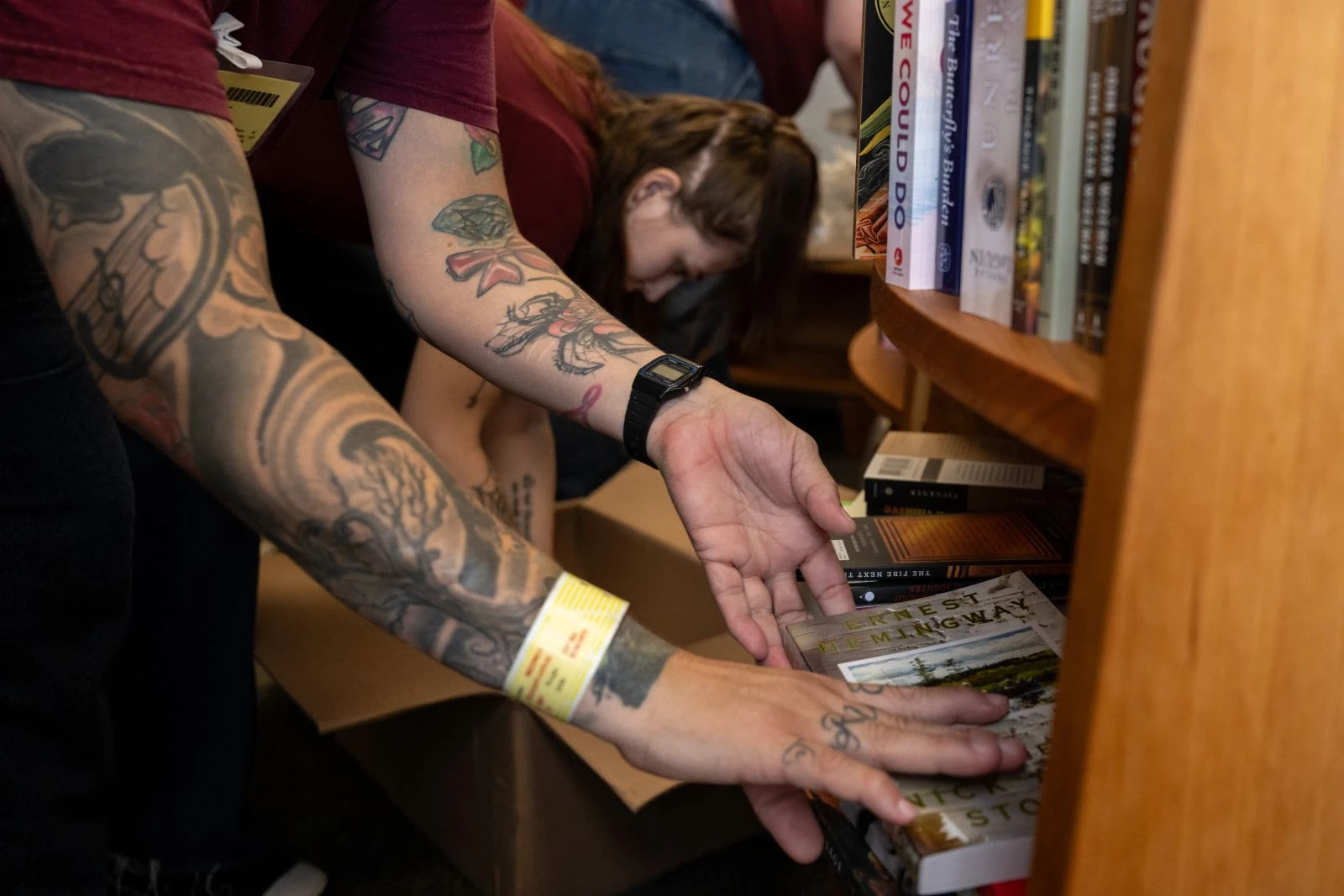 Women at York Correctional Institute shelving the 500th Freedom Library in community with the Freedom Reads team.
